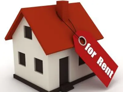 a house with a for rent tag