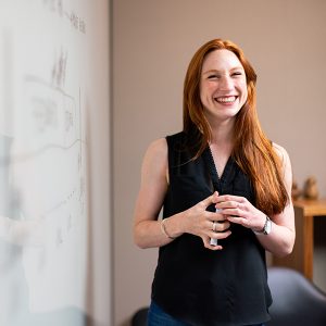 Red haired woman smiling